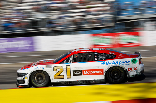 Side view of the number 21 car on track