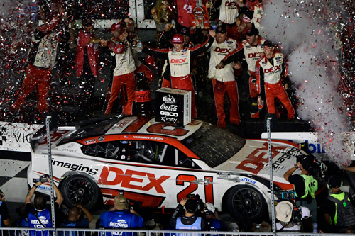 Burton and team celebrating their win