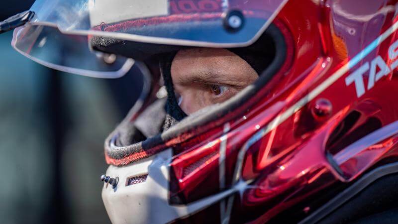 Very close up shot of Tasca in a helmet