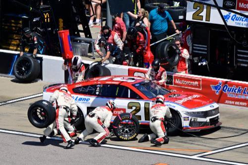 Pit crew in action on a NASCAR