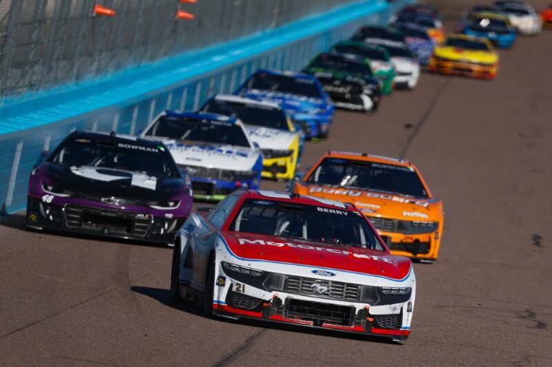 Car number 21 head on with competitors behind