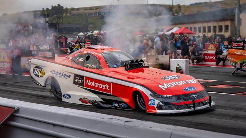 Funny car with smoke in the background