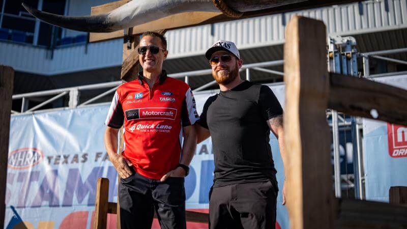 Tasca and man posing for a picture