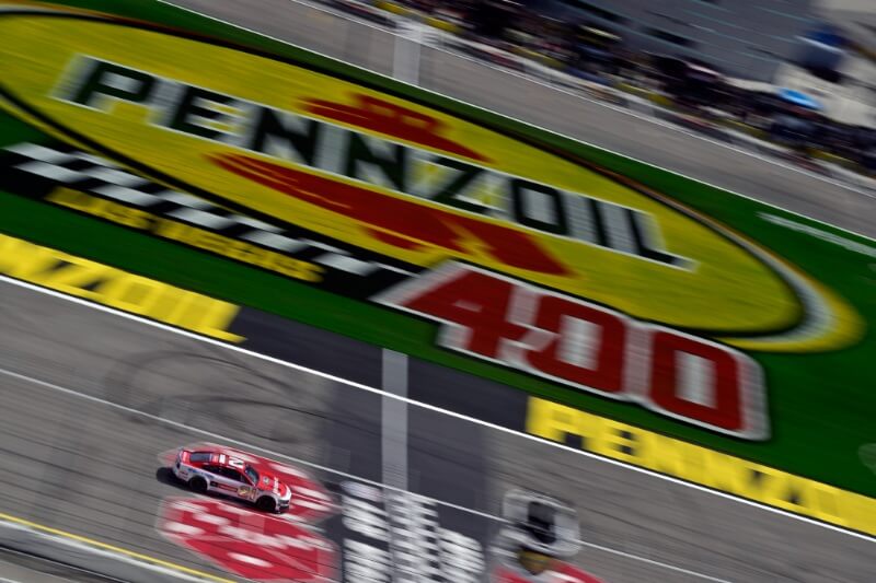 Penzoil 400 aerial view of number 21 crossing the finish line