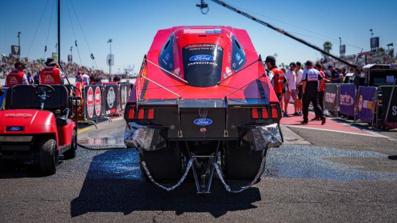 Back view of getting into the NHRA funny car