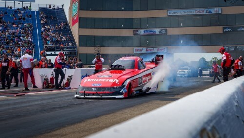 Austin Prock taking off at the start line with visible smoke