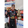 Tasca holding trophy